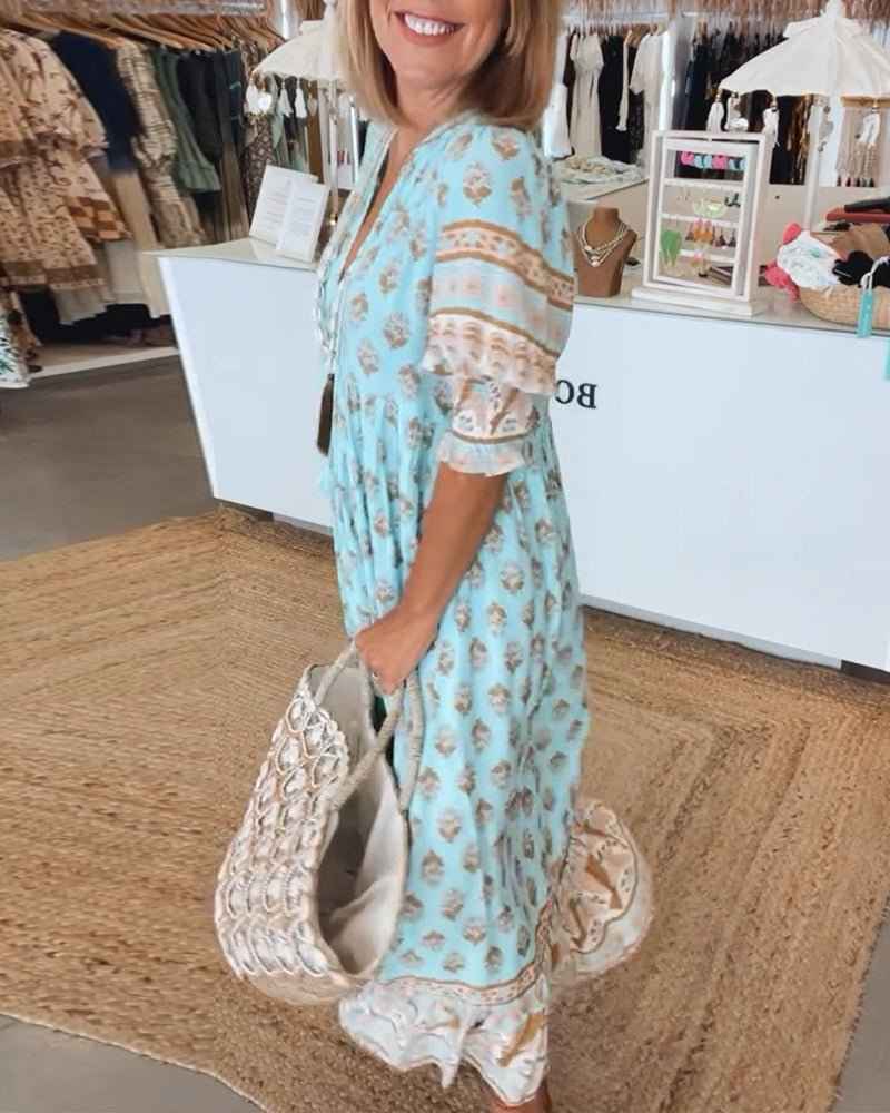 MANA | ABITO FLORALE CHIQUE MIDI CON SCOLLATURA A V