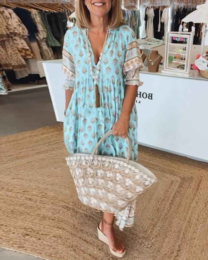 MANA | ABITO FLORALE CHIQUE MIDI CON SCOLLATURA A V