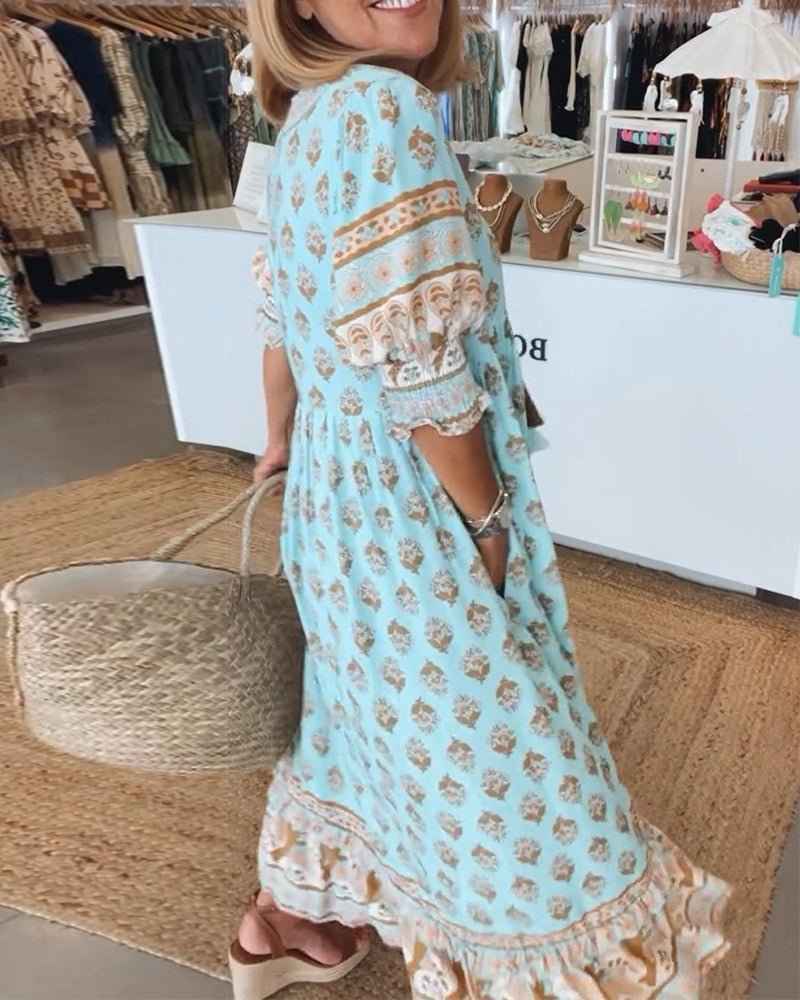 MANA | ABITO FLORALE CHIQUE MIDI CON SCOLLATURA A V