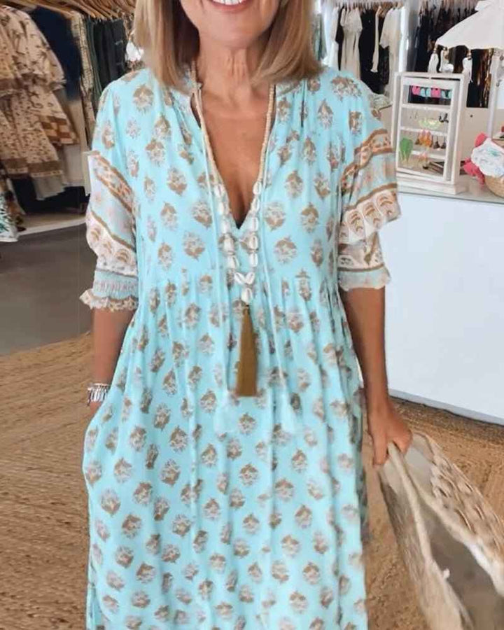 MANA | ABITO FLORALE CHIQUE MIDI CON SCOLLATURA A V