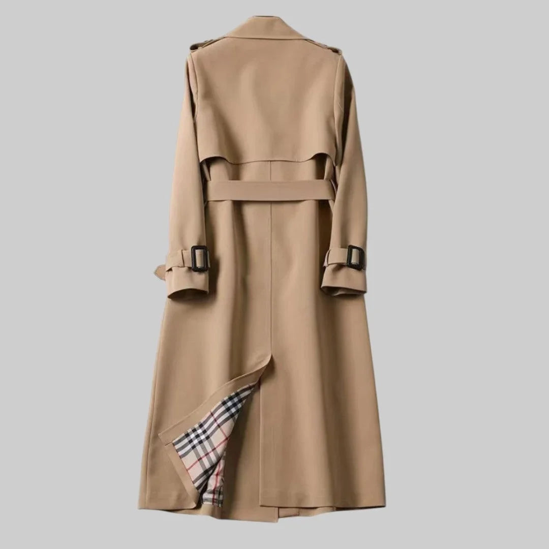 Women's beige double-breasted trench coat with belted waist and plaid lining