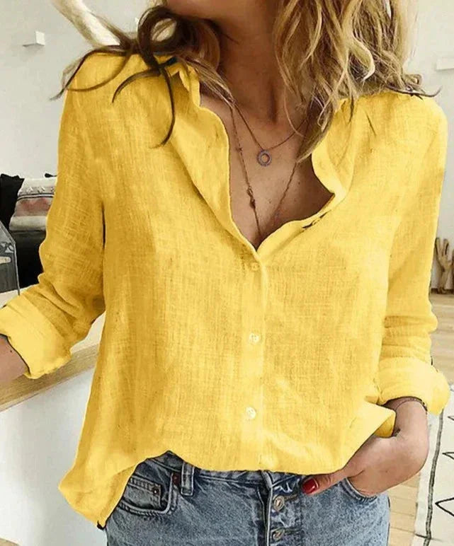 Women's button-down long-sleeve blouse with textured fabric