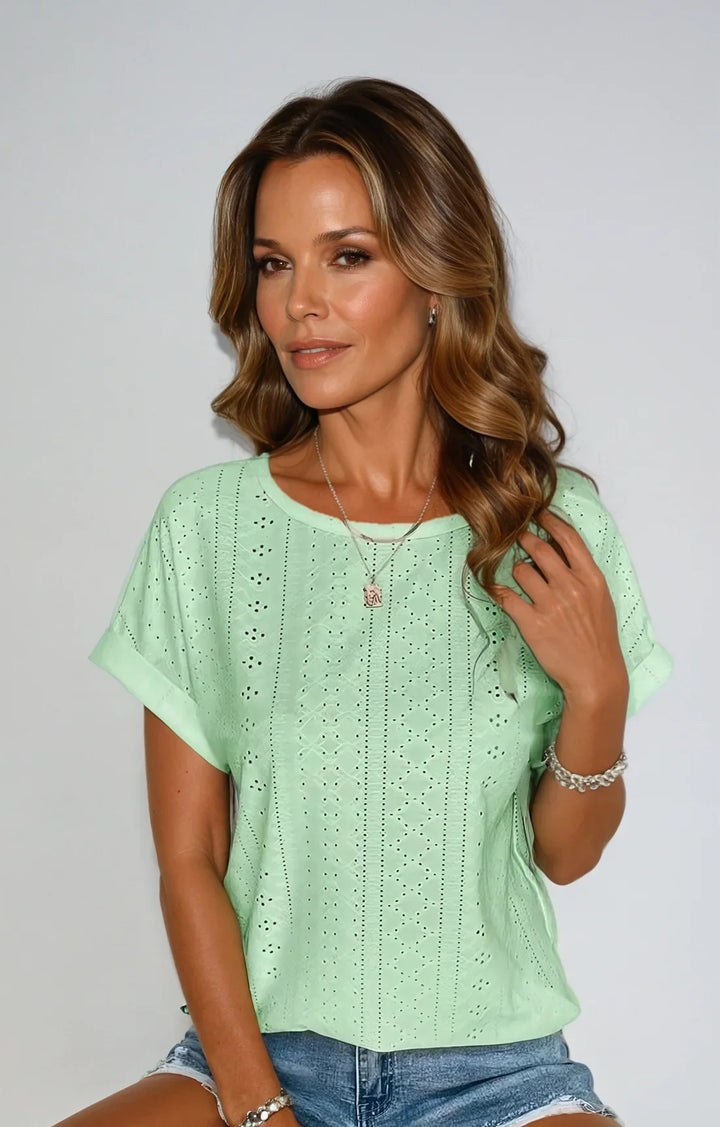 Women's eyelet short-sleeve top with crew-neck and cuffed sleeves
