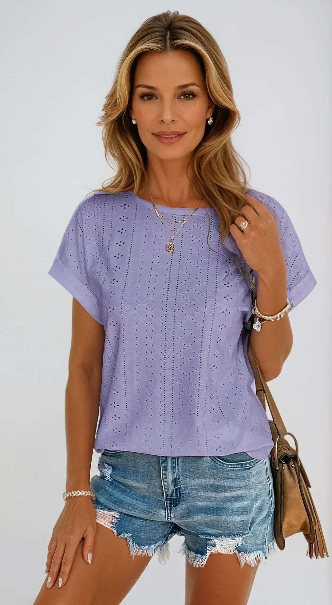 Women's eyelet short-sleeve top with crew-neck and cuffed sleeves
