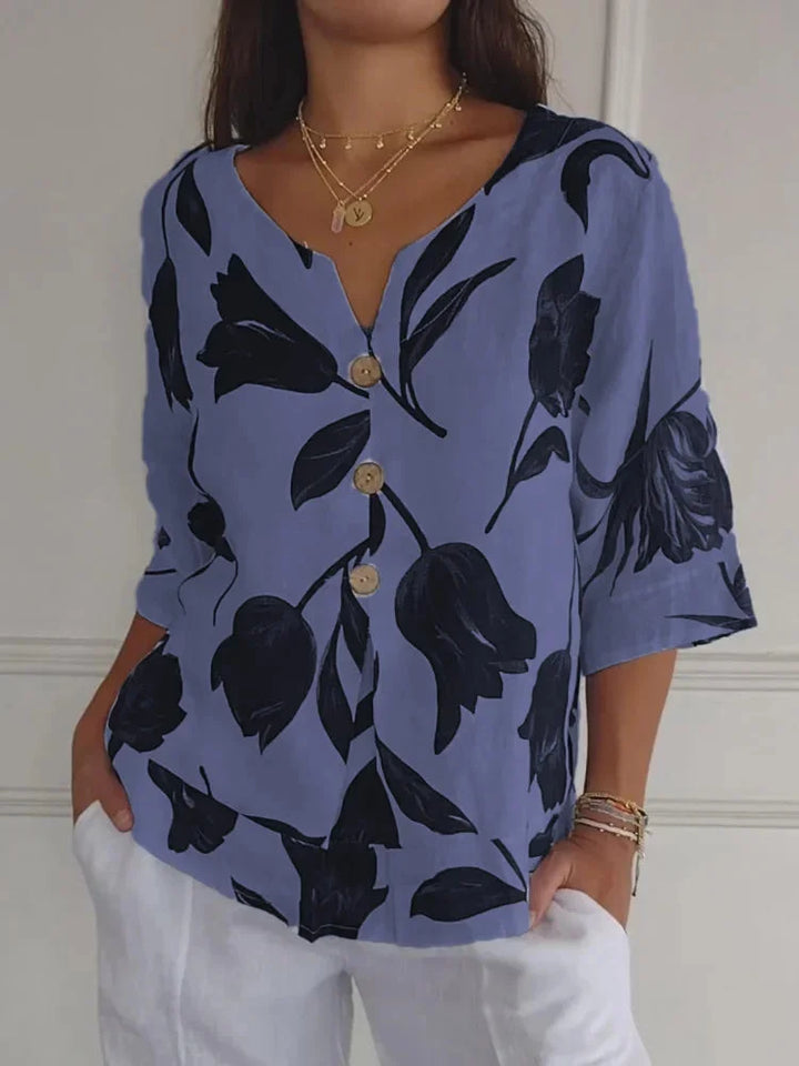Women's floral 3/4-sleeve blouse with V-neck button-up detail