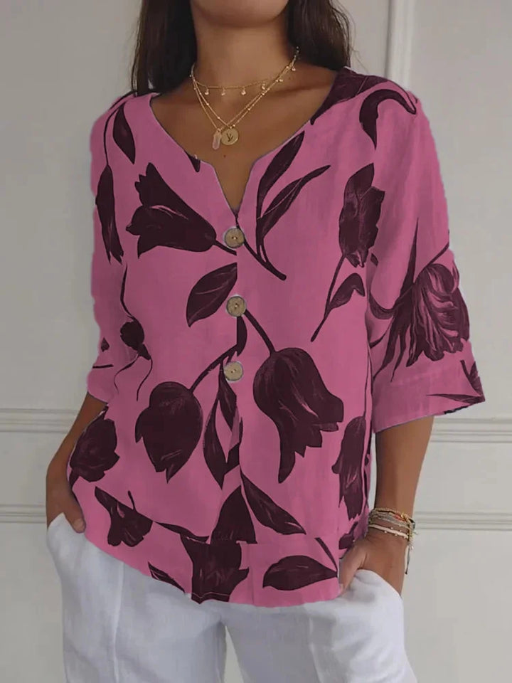 Women's floral 3/4-sleeve blouse with V-neck button-up detail