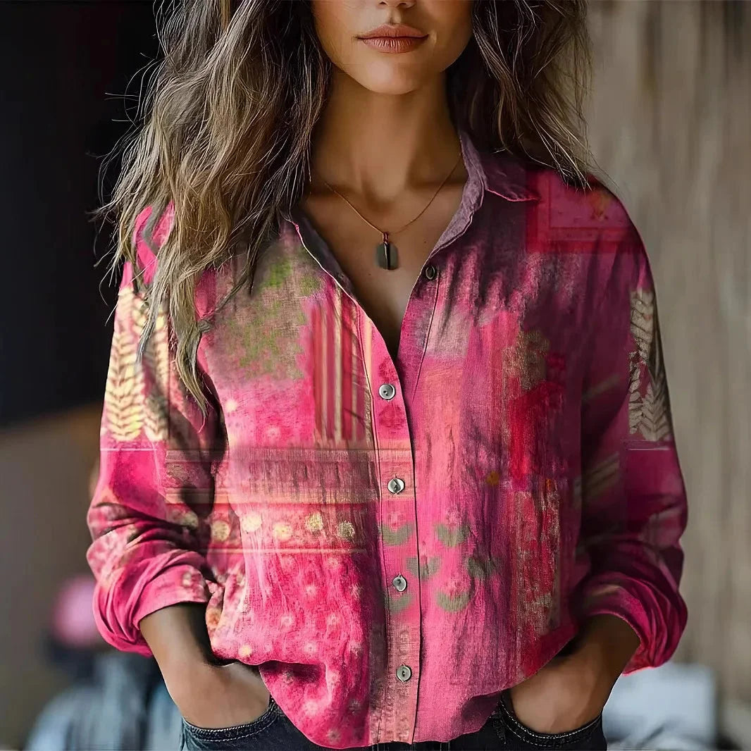 Women's floral collared button-down shirt with long sleeves and chest pockets