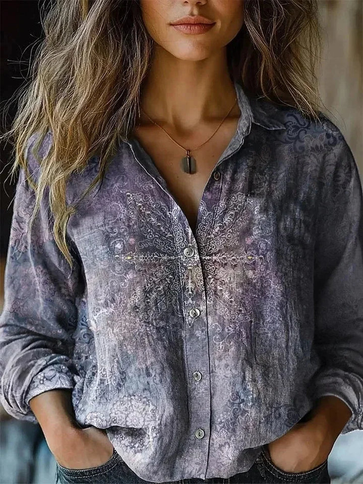 Women's floral collared button-down shirt with long sleeves and chest pockets