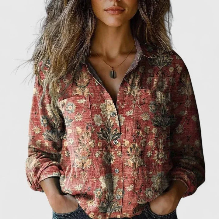 Women's floral collared button-down shirt with long sleeves and chest pockets