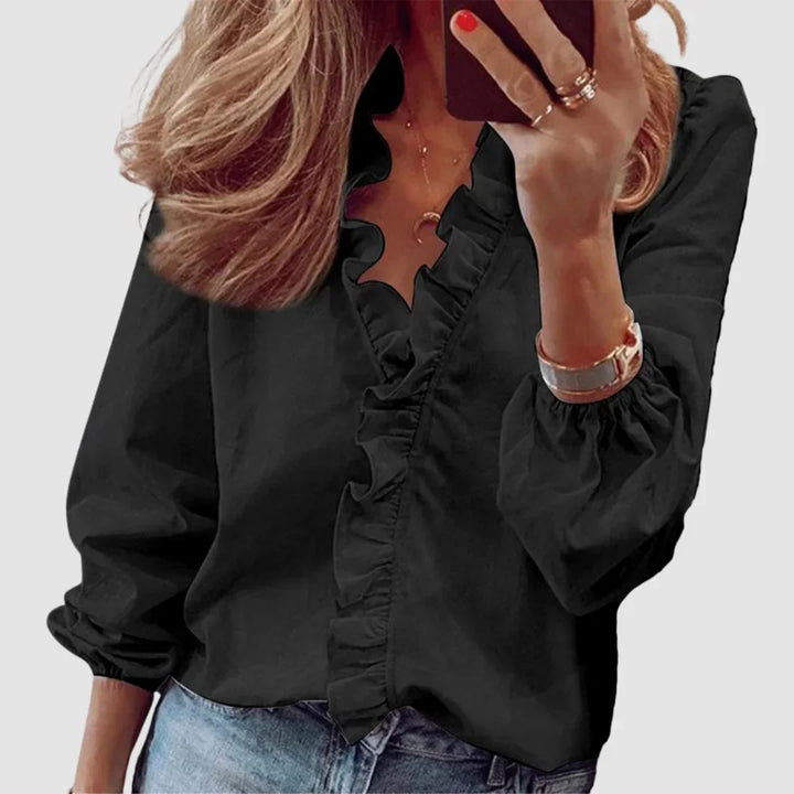 Women's floral long sleeve blouse with ruffled V-neck and gathered cuffs