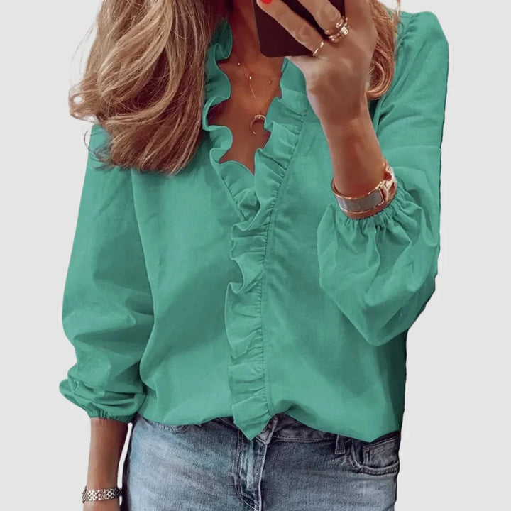 Women's floral long sleeve blouse with ruffled V-neck and gathered cuffs
