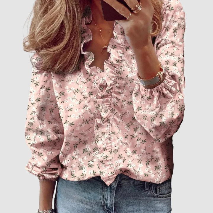 Women's floral long sleeve blouse with ruffled V-neck and gathered cuffs