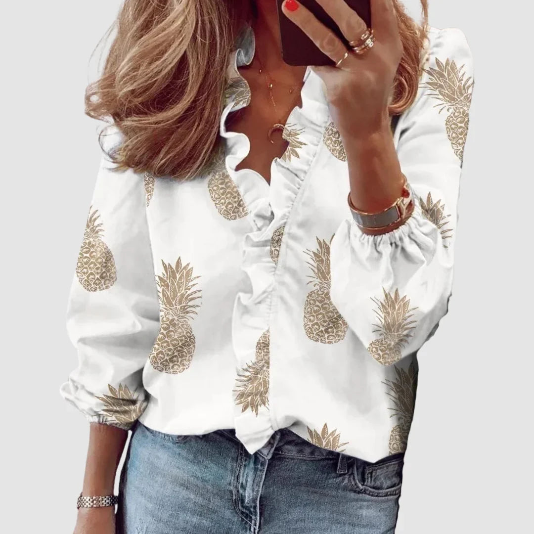 Women's floral long sleeve blouse with ruffled V-neck and gathered cuffs