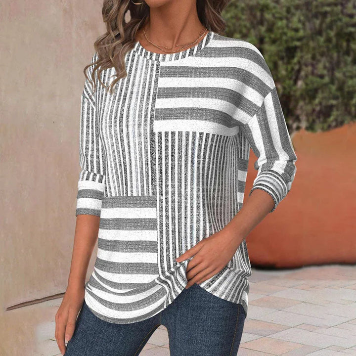 Women's knit patchwork striped blouse with 3/4 sleeves and crew neck