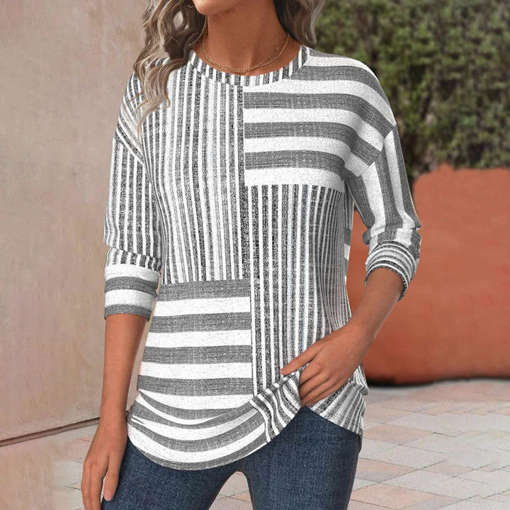 Women's knit patchwork striped blouse with 3/4 sleeves and crew neck