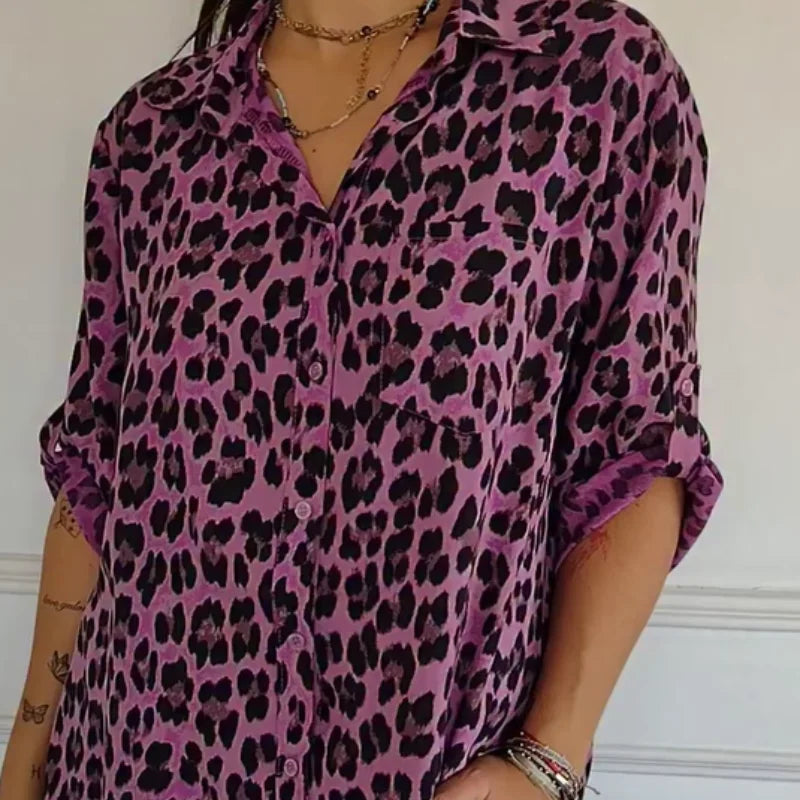 Women's leopard-print button-front blouse with rolled 3/4 sleeves and V-neck