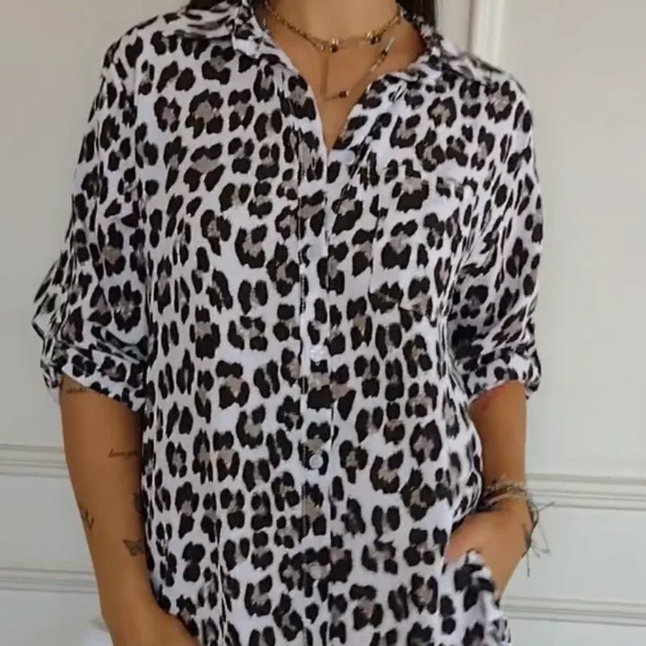Women's leopard-print button-front blouse with rolled 3/4 sleeves and V-neck