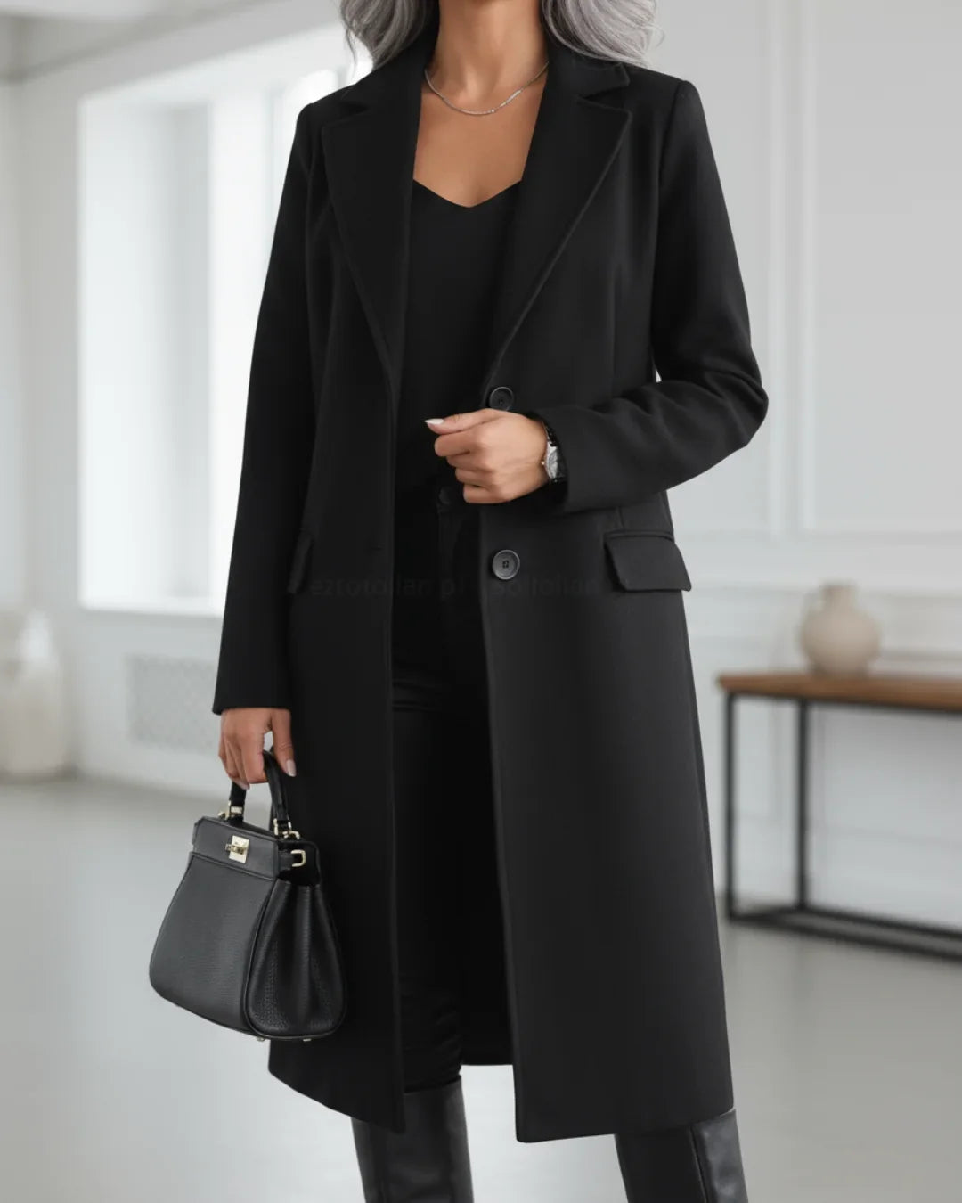 Women's long tailored wool coat with notched lapel and single-breasted front