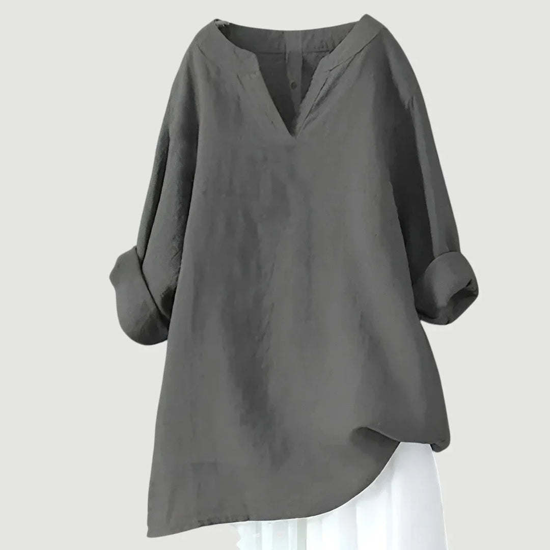 Women's loose-fit linen long-sleeve blouse with V-neck and rolled sleeves