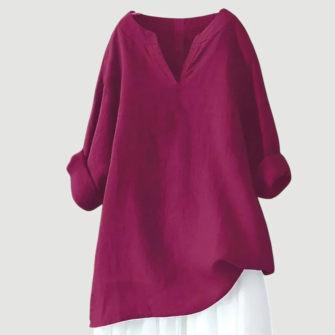 Women's loose-fit linen long-sleeve blouse with V-neck and rolled sleeves