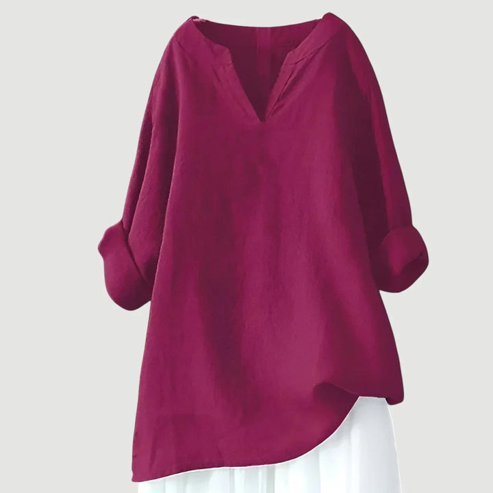 Women's loose-fit linen long-sleeve blouse with V-neck and rolled sleeves