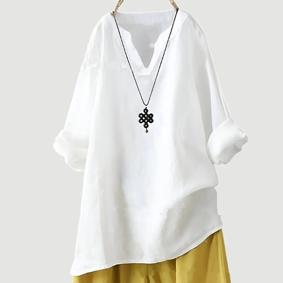 Women's loose-fit linen long-sleeve blouse with V-neck and rolled sleeves