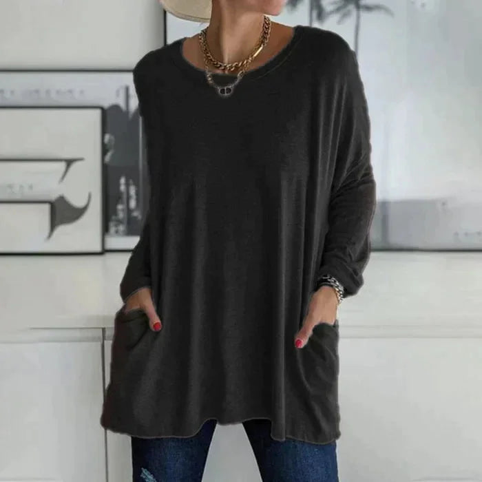 Women's oversized long sleeve tunic top with round neck and pockets