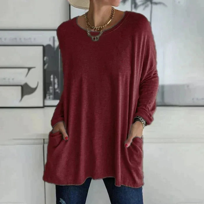 Women's oversized long sleeve tunic top with round neck and pockets