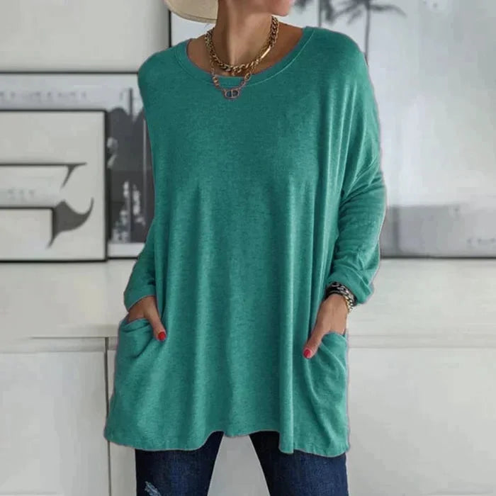 Women's oversized long sleeve tunic top with round neck and pockets