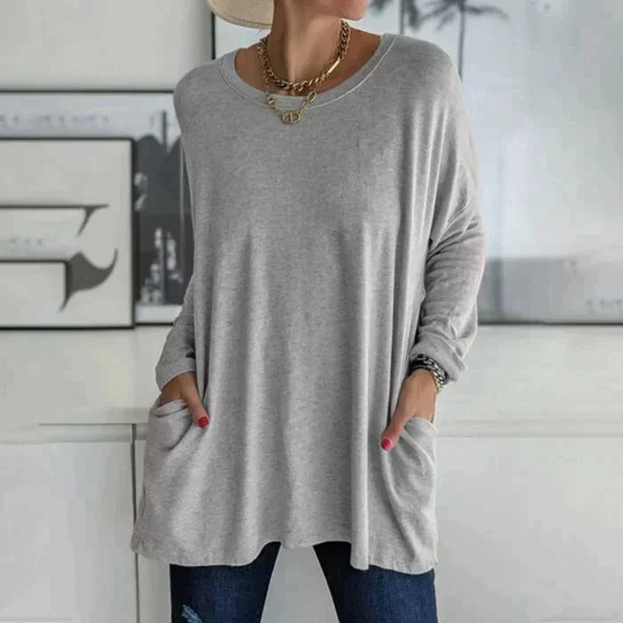 Women's oversized long sleeve tunic top with round neck and pockets