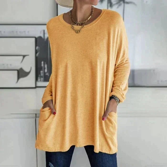Women's oversized long sleeve tunic top with round neck and pockets