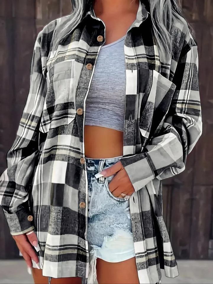 Women's oversized plaid flannel long-sleeve button-down shirt with chest pockets