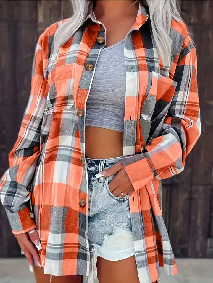 Women's oversized plaid flannel long-sleeve button-down shirt with chest pockets