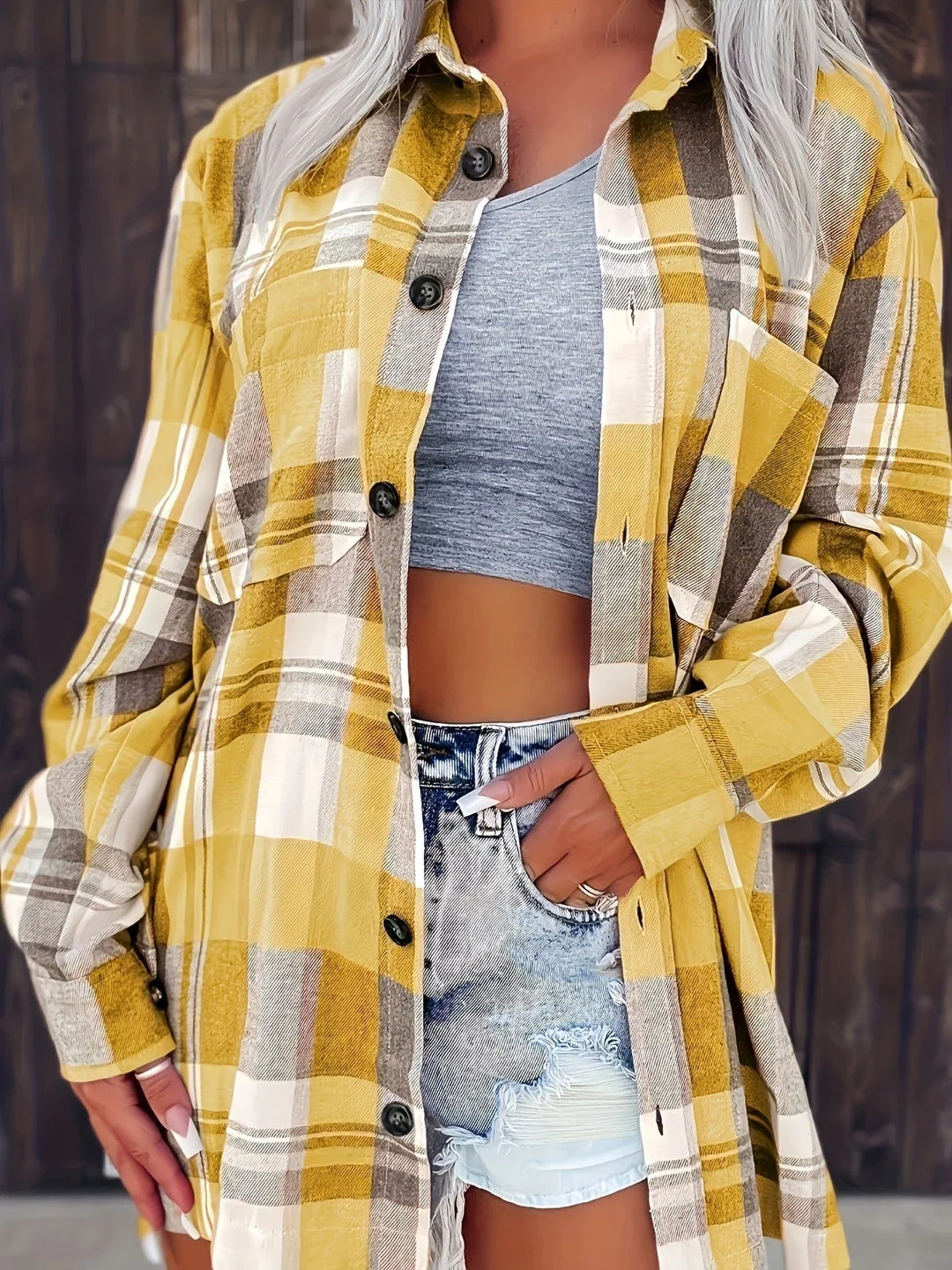Women's oversized plaid flannel long-sleeve button-down shirt with chest pockets
