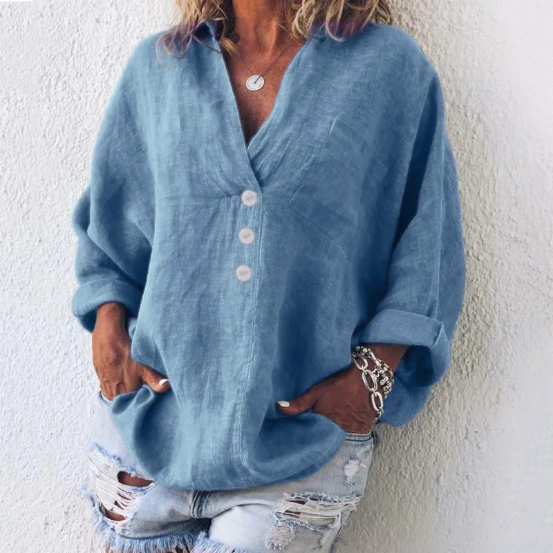 Women's oversized V-neck top with button-front long sleeves and chest pocket