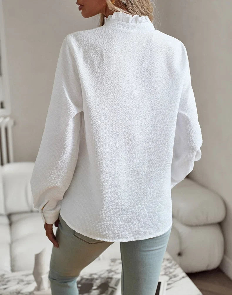 Women's pale blue textured striped blouse with long sleeves and ruffled stand-collar