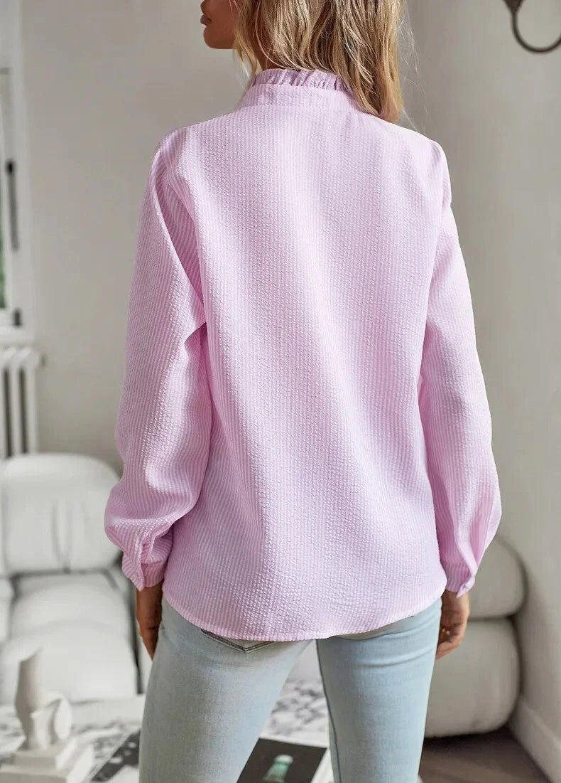 Women's pale blue textured striped blouse with long sleeves and ruffled stand-collar