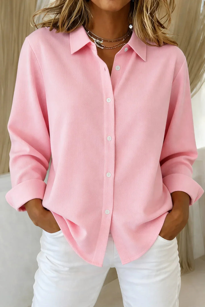 Women's pink long-sleeve collared blouse with button-front and contrast stitching