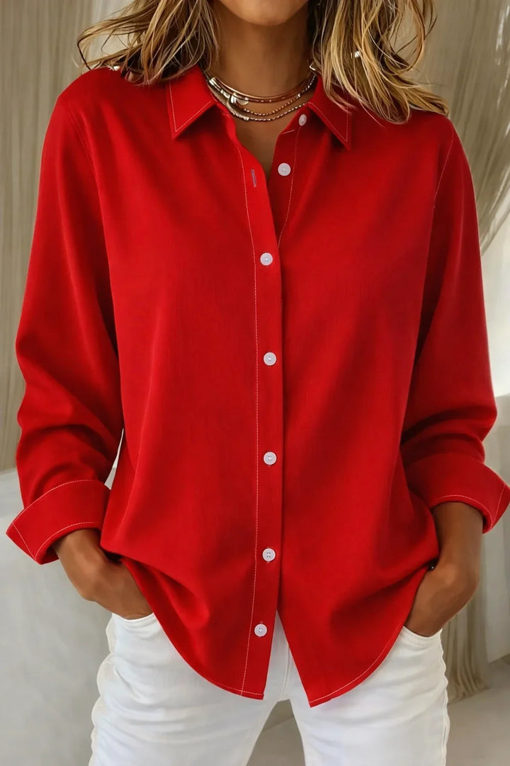 Women's pink long-sleeve collared blouse with button-front and contrast stitching