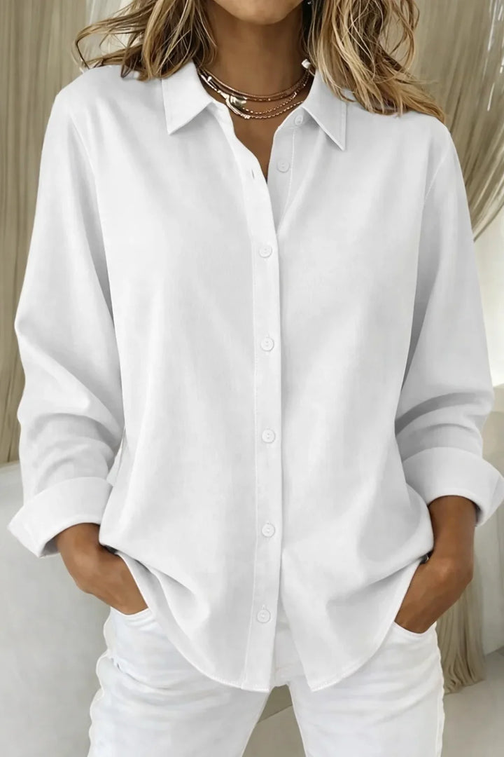 Women's pink long-sleeve collared blouse with button-front and contrast stitching