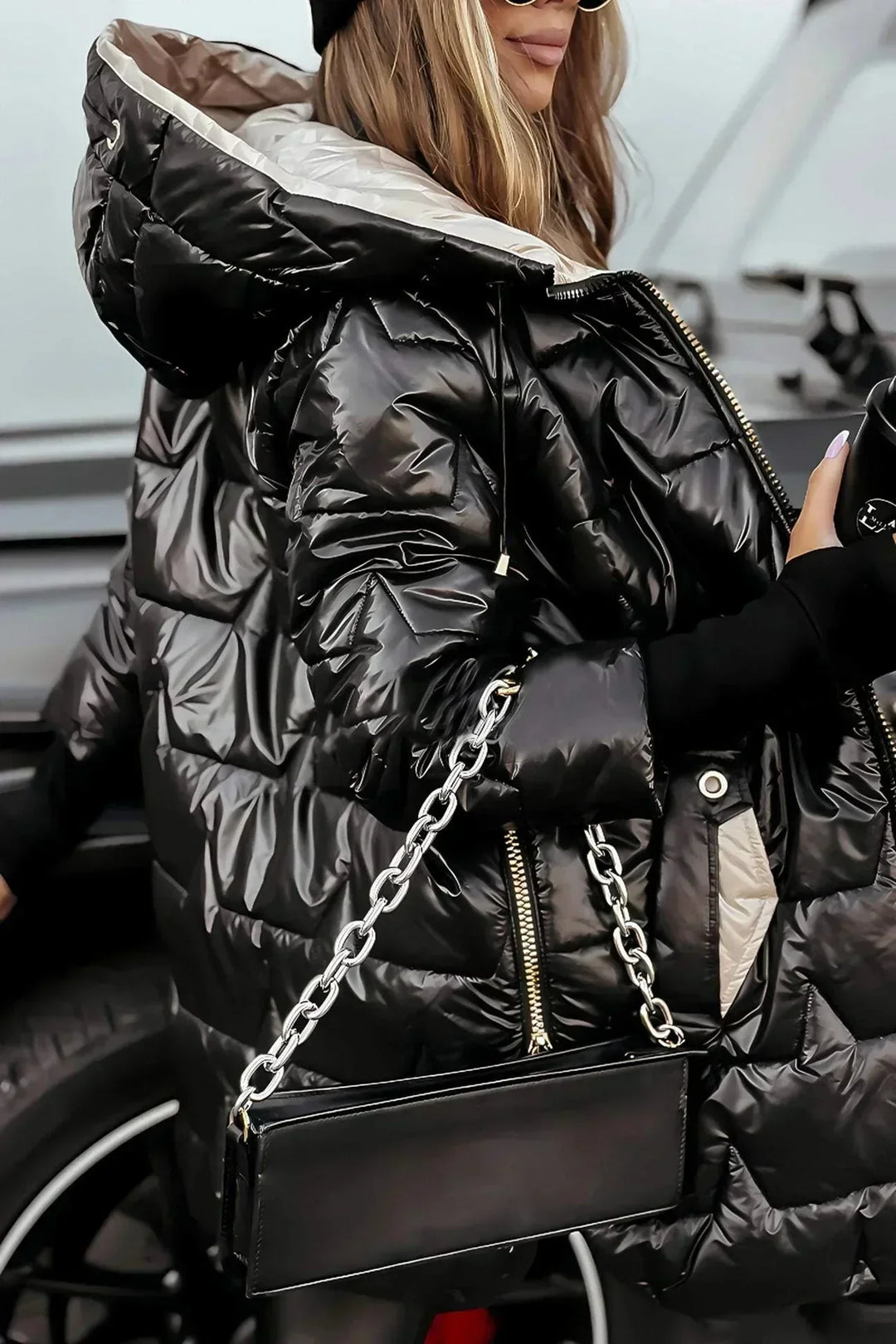 Women's quilted metallic hooded puffer jacket with full zip closure