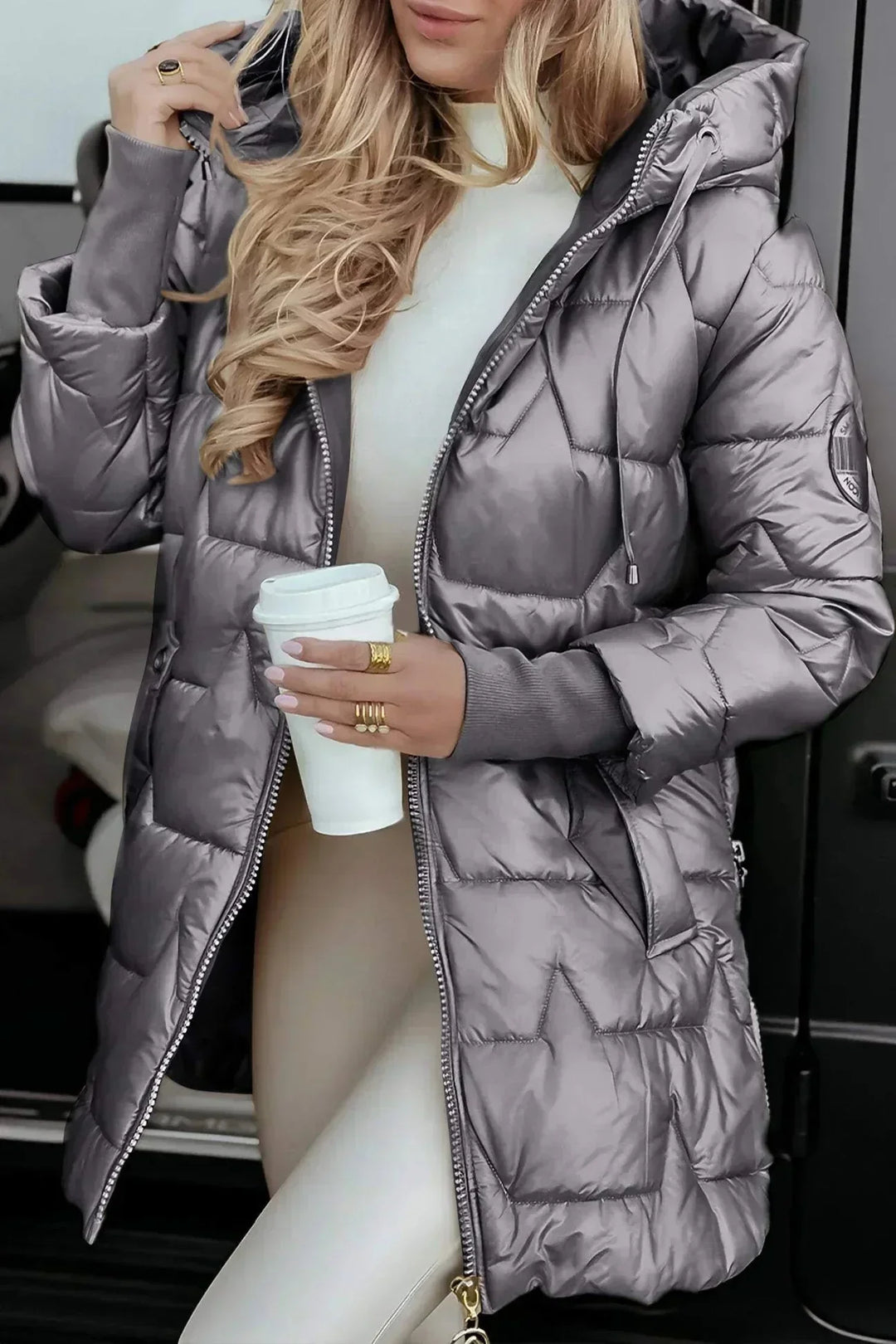 Women's quilted metallic hooded puffer jacket with full zip closure