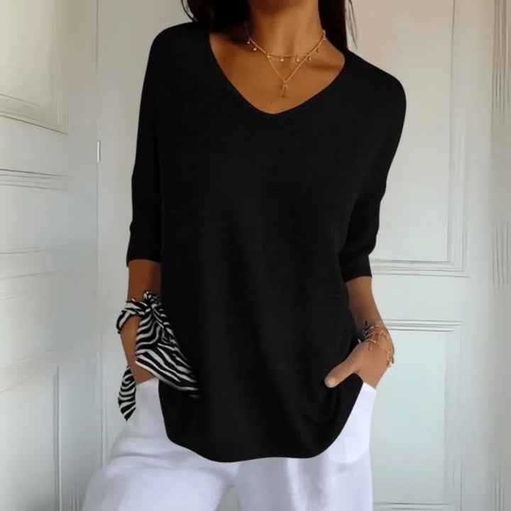 Women's relaxed-fit lightweight knit top with V-neck and 3/4-sleeves