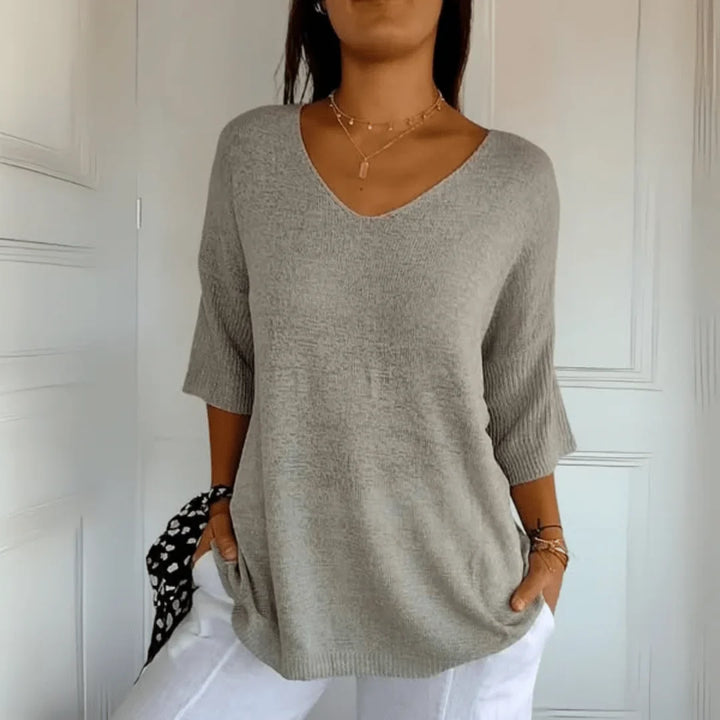 Women's relaxed-fit lightweight knit top with V-neck and 3/4-sleeves