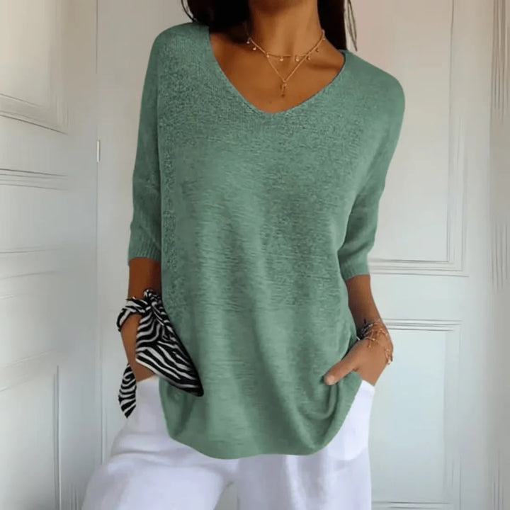 Women's relaxed-fit lightweight knit top with V-neck and 3/4-sleeves